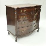 A late George III mahogany serpentine fronted chest in the manner of Chippendale and Haig,