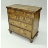 An early 18th Century walnut bachelor's chest,