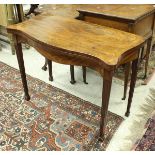 A 19th Century mahogany tea table in the Hepplewhite taste,