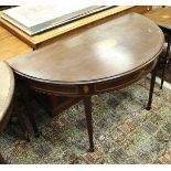 An Edwardian mahogany side table of demi-lune form,