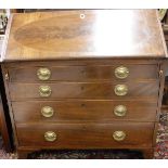 A late George III mahogany bureau,