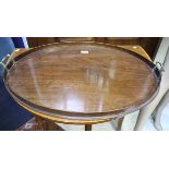 A 19th Century mahogany oval brass handled tray