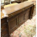 A modern Bassett mahogany side cabinet, the plain top over two cushion drawers,