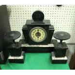 A 1930's black marble and grey-veined white marble clock garniture in the Art Deco style