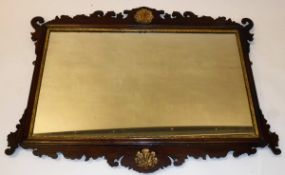 A 19th Century mahogany framed fretwork carved wall mirror in the early 18th Century manner 70cm