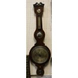 A 19th Century rosewood cased banjo barometer thermometer with silvered dials and central convex