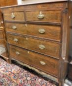 A 19th Century mahogany chest of two short over three long graduated drawers on splayed bracket