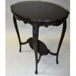 An Edwardian mahogany oval two tier ocassional table together with an Edwardian mahogany framed