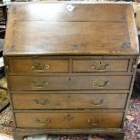 An 18th Century oak bureau,