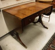 A 19th Century rosewood sofa table of typical form,