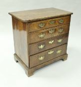 An 18th Century walnut chest,