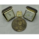 A "Robert Latham Medal", a Seiko travel clock,