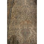 An Isfahan prayer rug with Tree of Life decoration to centre on a cream ground,