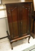 An early 20th Century mahogany cased sheet music cabinet,