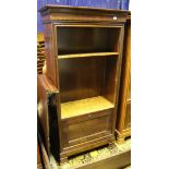 A Simon Horn cherrywood bookcase cabinet with adjustable shelving