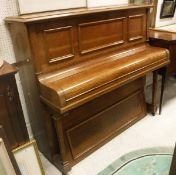 An early 20th Century oak cased upright piano by Hickeys of Gloucester
