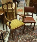 A set of four Victorian style leather dining chairs with spindle and studded backs and seats to