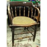 A cane seated smokers chair,