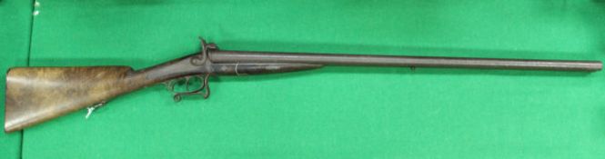 A 19th Century French breach loading shotgun, pin fire hammer action,