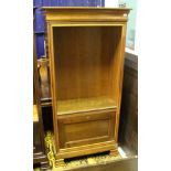 A Simon Horn cherrywood bookcase cabinet with adjustable shelving