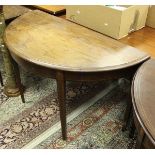 A circa 1900 mahogany side table of demi-lune form,