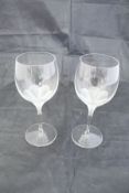 A set of twenty-three Sèvres wine glasses in the "Primavera" pattern