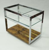 A Richard Young for Merrow Associates chrome framed bar cart or cocktail trolley with glass shelves