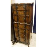 A mid 20th Century walnut chest on chest in the 18th Century Dutch style with three drawers above