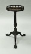 A mahogany kettle stand in the George III taste, the circular top with galleried edge,