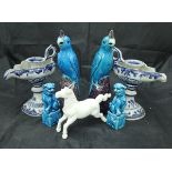 A pair of Continental tin glazed pottery blue and white chamber sticks,