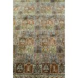 A Persian carpet, the central panel set with repeating tiled pattern,