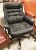 A leather office swivel chair