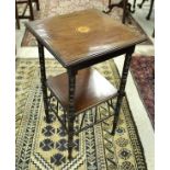 A circa 1900 mahogany and inlaid two tier occasional table in the manner of EW Godwin,