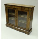 A Victorian walnut and marquetry inlaid side cabinet,