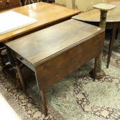 A 19th Century mahogany drop-leaf Pembroke table with single end drawer and a 20th Century green /