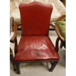 A mahogany framed red leather upholstered carver chair