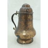 A 19th Century middle eastern copper dredger of baluster form with iron handle