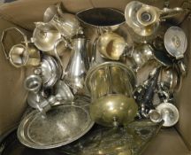 A box of assorted plated wares to include candlesticks, biscuit barrel, various trays, etc.