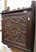 A Victorian carved walnut wall cupboard in the art nouveau style,