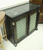 A black lacquered and japaned chiffonier in the Regency style with green marble top over a foliate