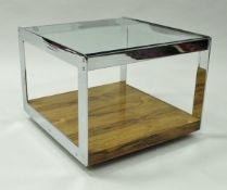 A Richard Young for Merrow Associates chrome framed low table of square form with glass toped Rio