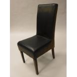 A set of eight upholstered high back dining chairs on square tapered legs