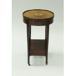 A 19th Century mahogany and inlaid side table of oval form,