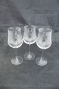 A set of fourteen JG Durand wine glasses, seven Edinburgh Crystal cut glass beakers,