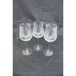 A set of fourteen JG Durand wine glasses, seven Edinburgh Crystal cut glass beakers,