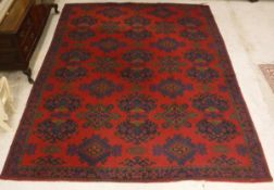 A machine woven Persian design rug,