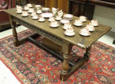 An oak refectory style dining table in the 17th Century manner,
