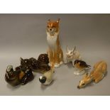 A collection of Lomonosov porcelain animals including "Seated Cat", "Dog", "Bear", "Fawn",