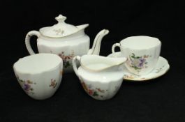 A Royal Crown Derby "Derby Posies" pattern part tea set, four large decanters,