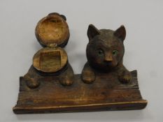 An early 20th Century Bavarian carved novelty pen rest,
